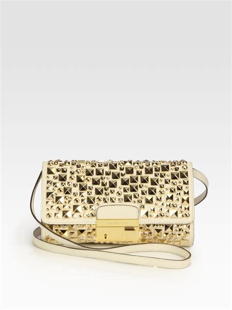 gold michael kors clutch|Michael Kors studded clutch.